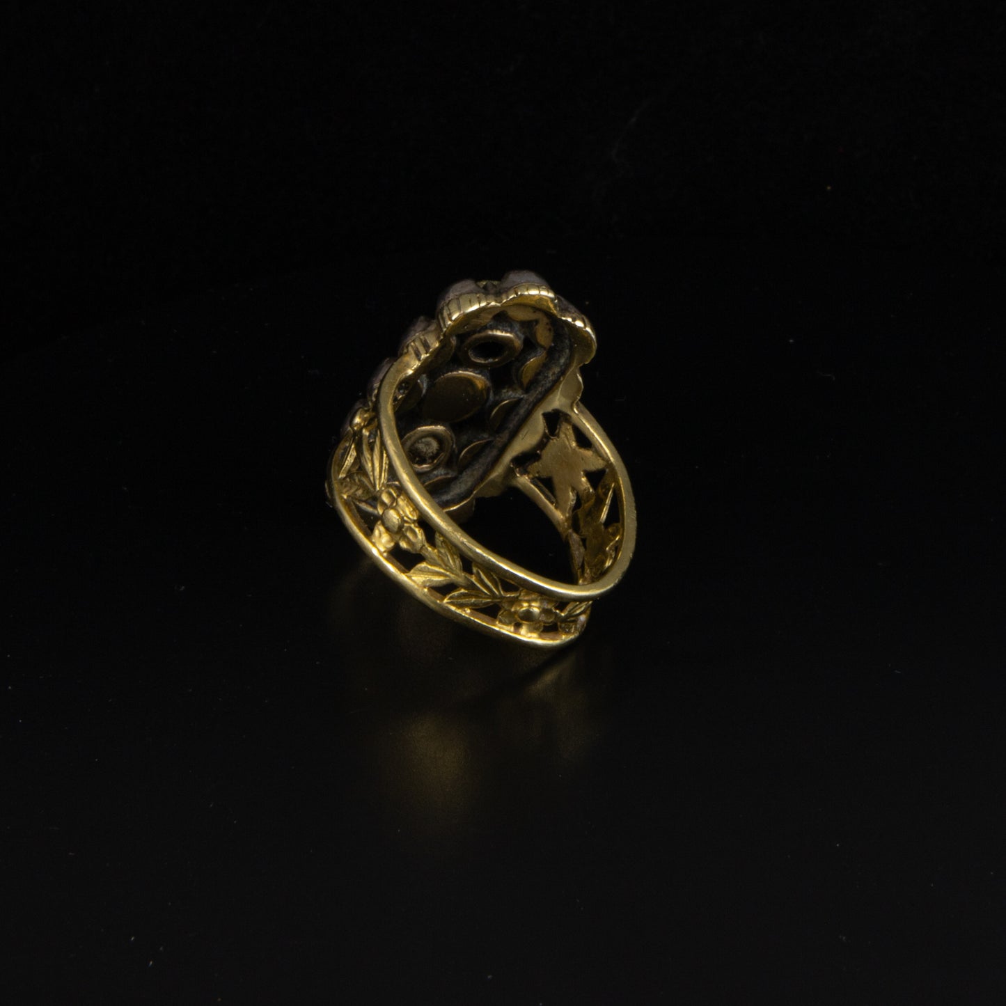Anillo oro amarillo, plata y diamante.
