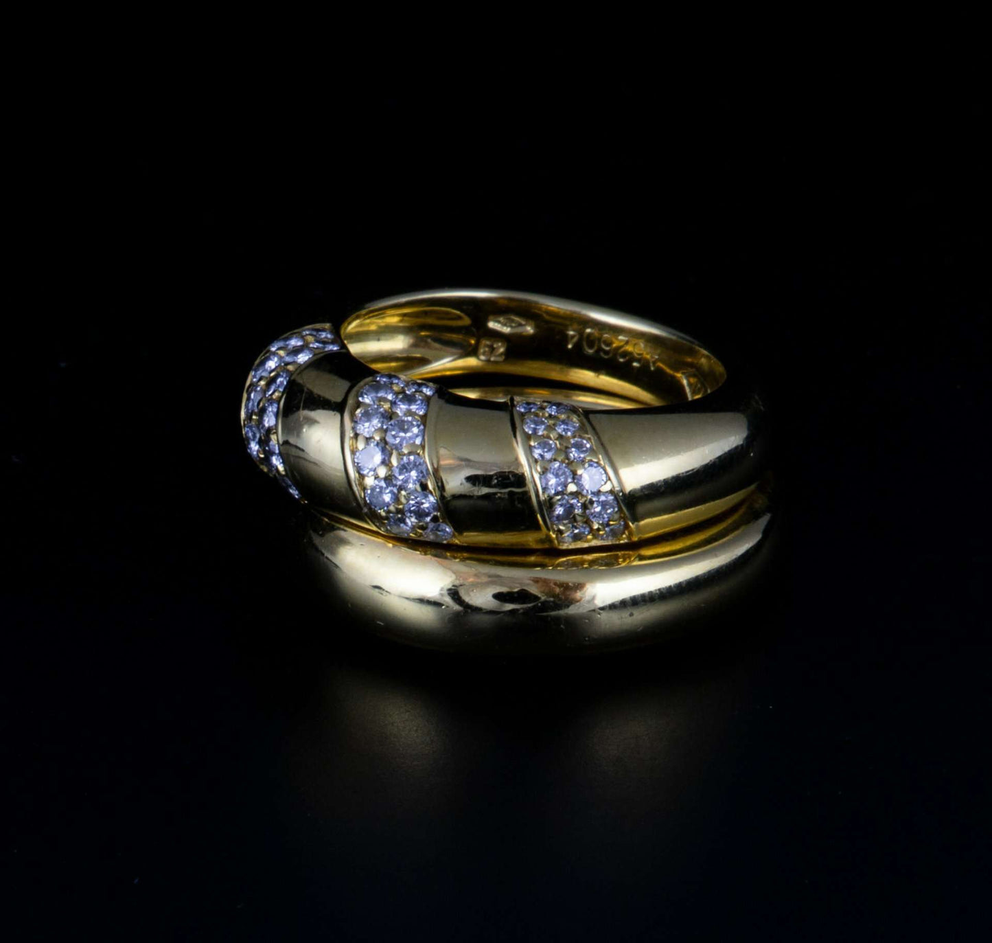 Anillo en oro y brillantes doble desmontable de la marca Piaget.