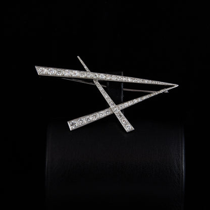 Broche oro blanco y brillantes.
