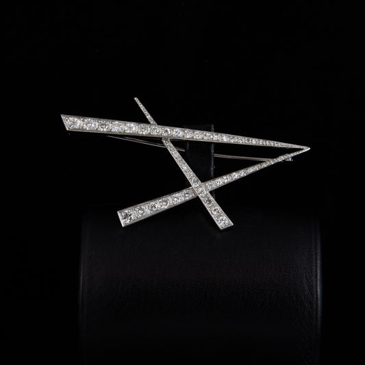 Broche oro blanco y brillantes.