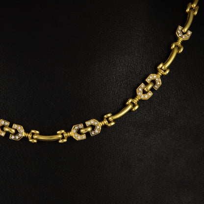 Cadena eslabón tipo Gucci, diamantes 1 qt, en oro amarillo. 40 cm.