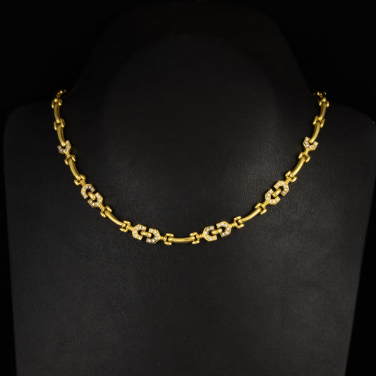 Cadena eslabón tipo Gucci, diamantes 1 qt, en oro amarillo. 40 cm.