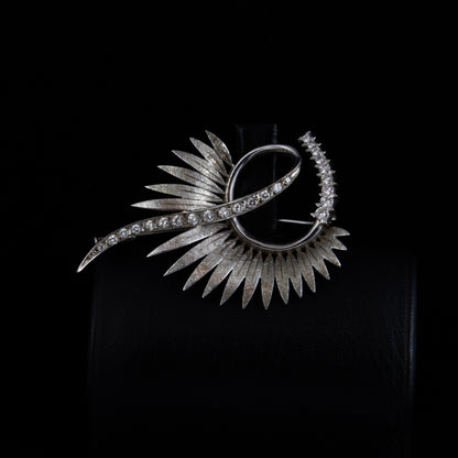 Broche oro blanco y diamantes años 90.