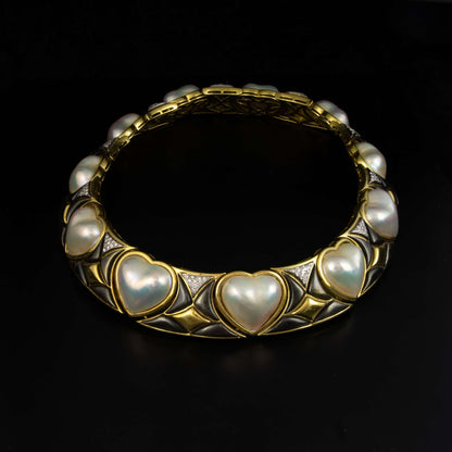 Collar de la marca Vasari en oro, perlas mabe, nacar negro y brillantes 252,1gr.