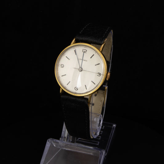 Reloj Longines, en oro amarillo de cuerda, 32 mm.
