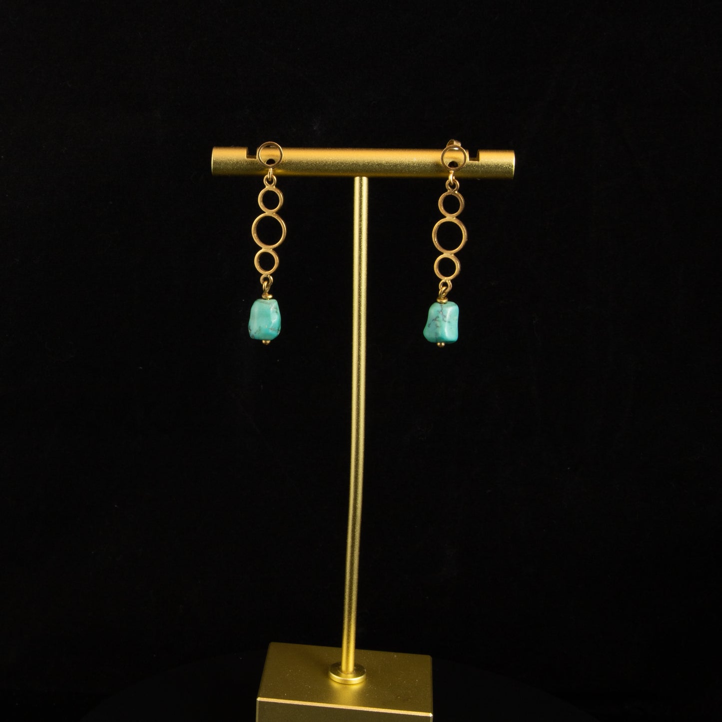 Pendientes oro y turquesas.