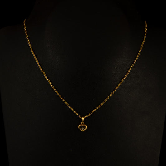 Colgante oro amarillo Pomellato Happy Diamonds Hearts, con cadena oro amarillo.