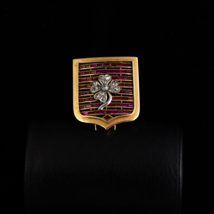 Broche escudo oro, rubis y diamantes