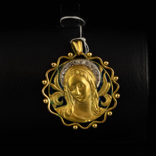 Medalla virgen esmalte y brillantes.