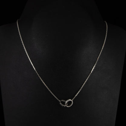 Colgante oro blanco Love Cartier diamantes.