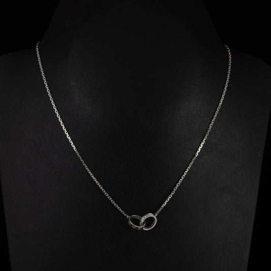 Colgante oro blanco Love Cartier diamantes.