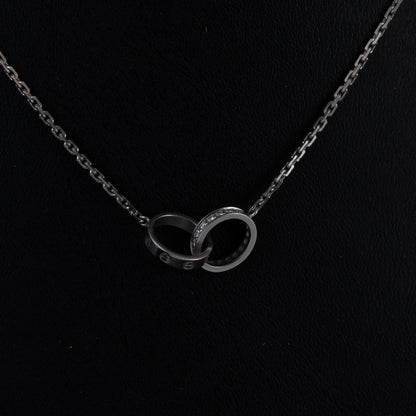 Colgante oro blanco Love Cartier diamantes.