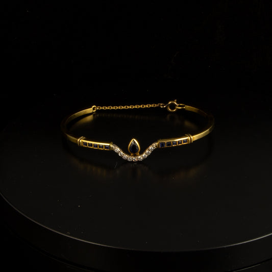 Esclava oro amarillo zafiros y diamantes.