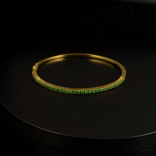 Esclava oro amarillo con esmeraldas 36*0.02 cts.