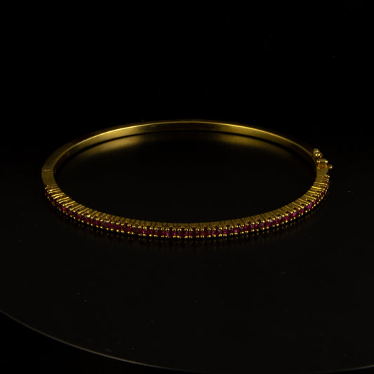 Esclava oro amarillo con rubis 36*0.02 cts.