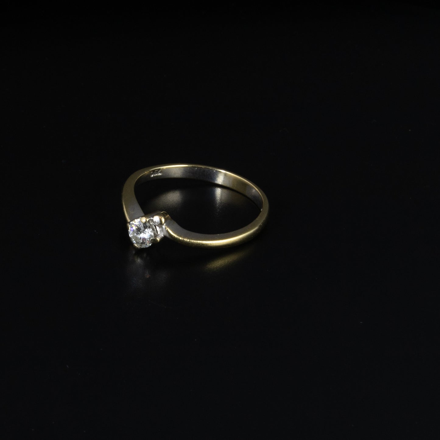 Solitario oro blanco  brillante 0.19 qts