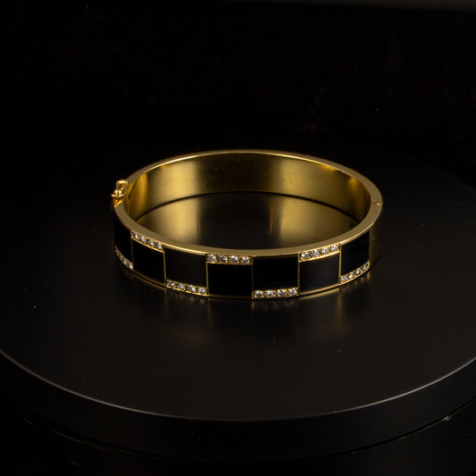 Esclava oro amarillo, brillantes y onix