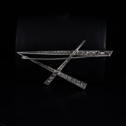 Broche oro blanco y brillantes.