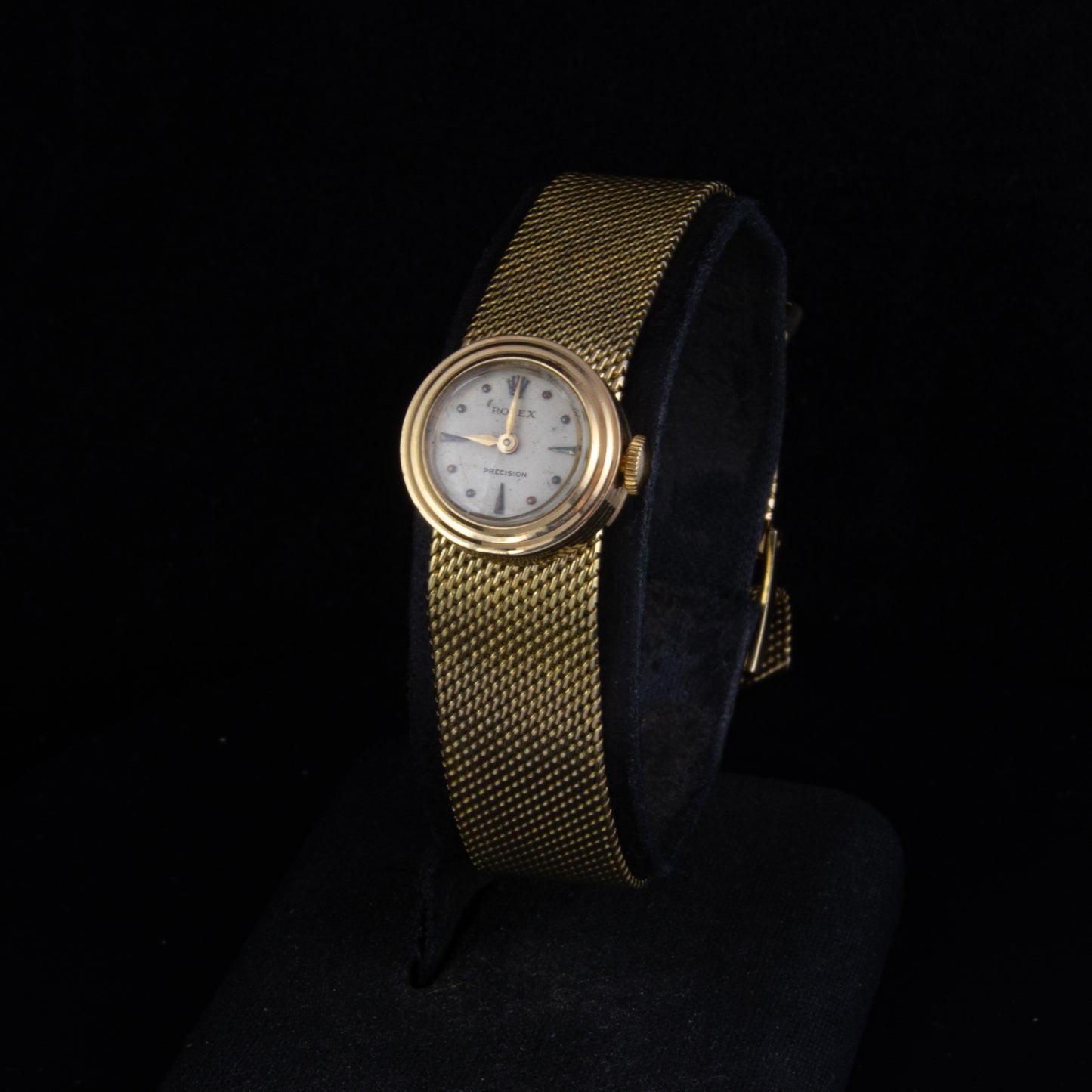 Rolex Precision de oro amarillo con brazalete de malla.