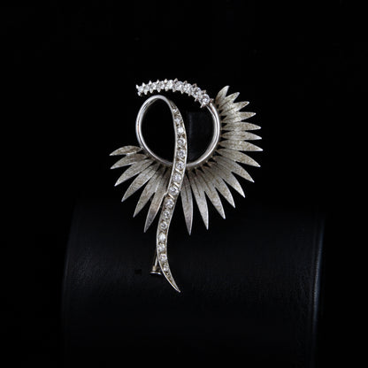 Broche oro blanco y diamantes años 90.