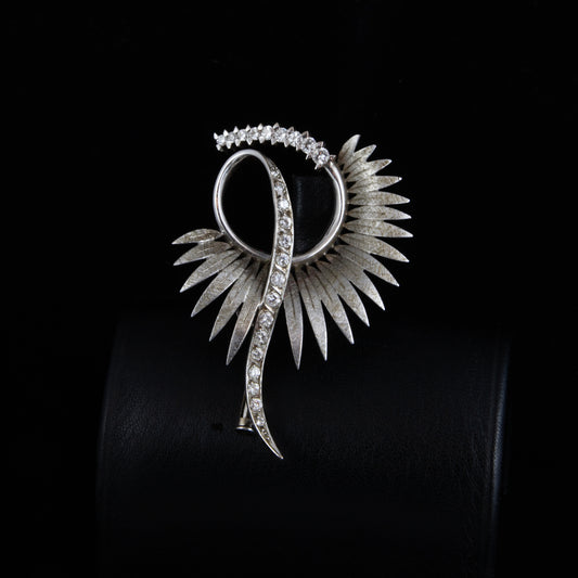 Broche oro blanco y diamantes años 90.