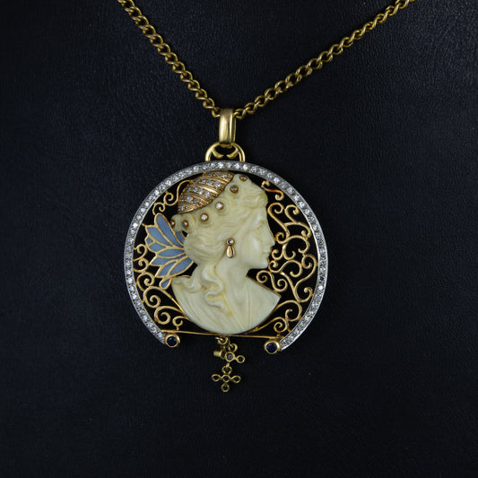 Colgante oro época modernista, diamantes, zafiros y esmalte.