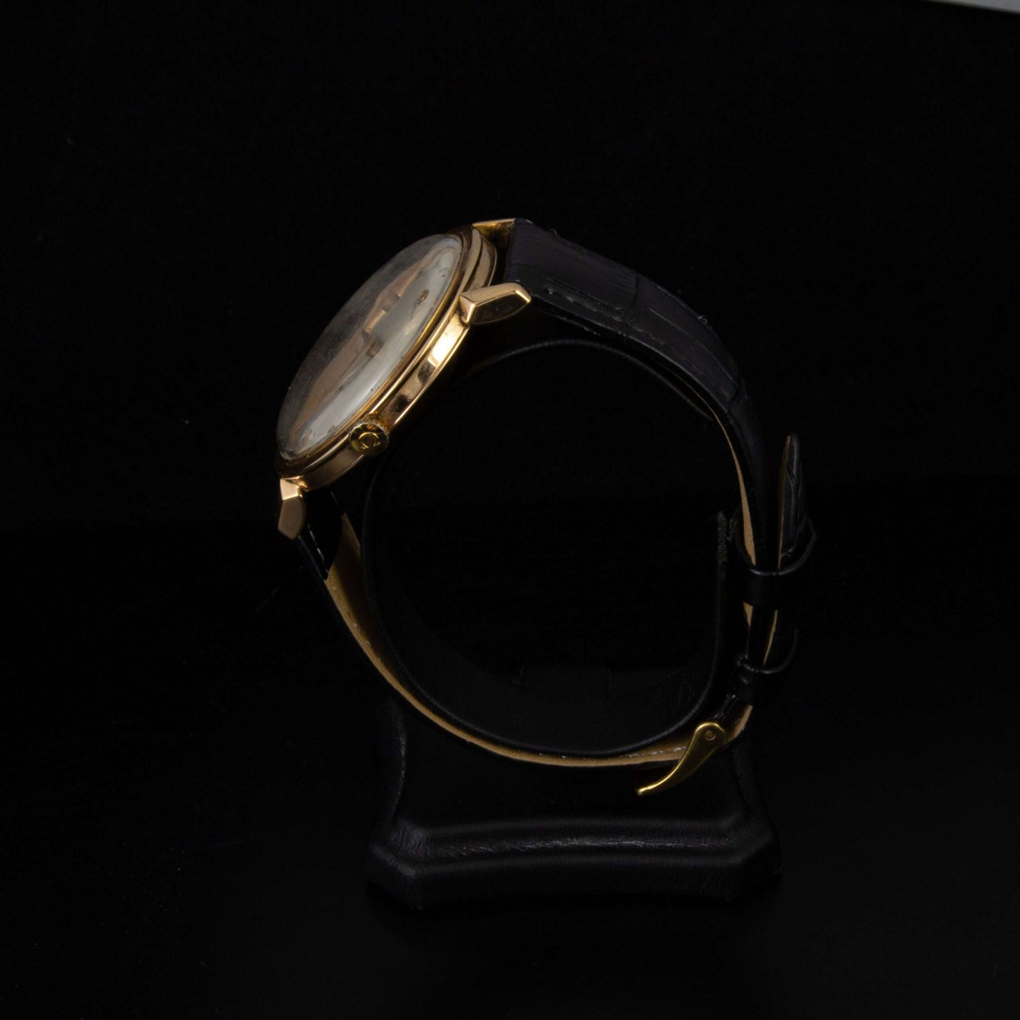 Reloj Omega en oro con correa de piel, de 36 mm..