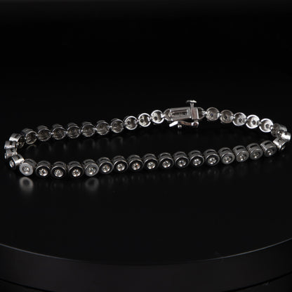 Riviere oro blanco y diamantes 0,02 qts x 41 con un total de 0,82 qts.